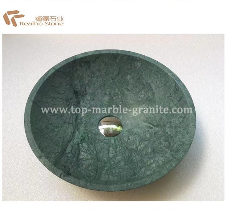 round stone vessel sink