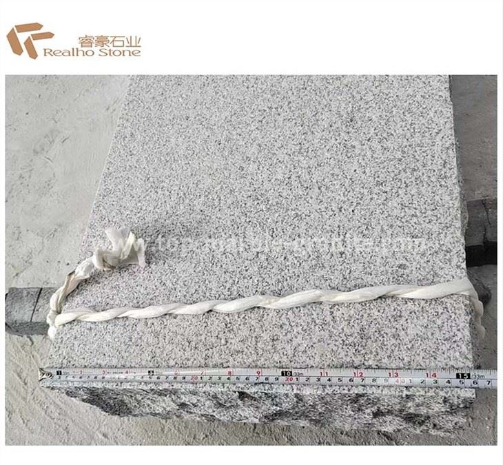 Granite paver with split edge